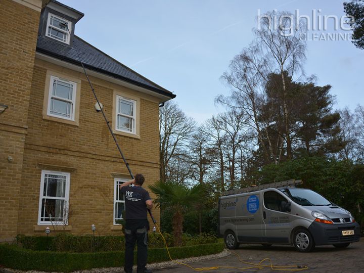 Highline Cleaning window cleaner and van at a customer home